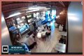 Four masked individuals remove Israeli flags at a Philadelphia cafe. - SarkariResult