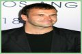 Jonny Lee Miller flashes ink for Ellen charity